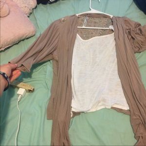 Thin top connected to a cardigan